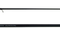 Two-piece black fishing rod laid out horizontally, foam grip on the left, reel seat mid‑section, and multiple line guides along the rod.